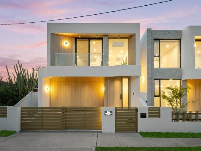Contemporary Double Brick Luxury with Double Side by Side Garage