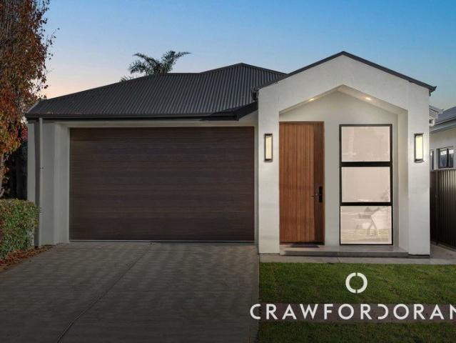 Contemporary Design and Low Maintenance Living in Perfect Sync