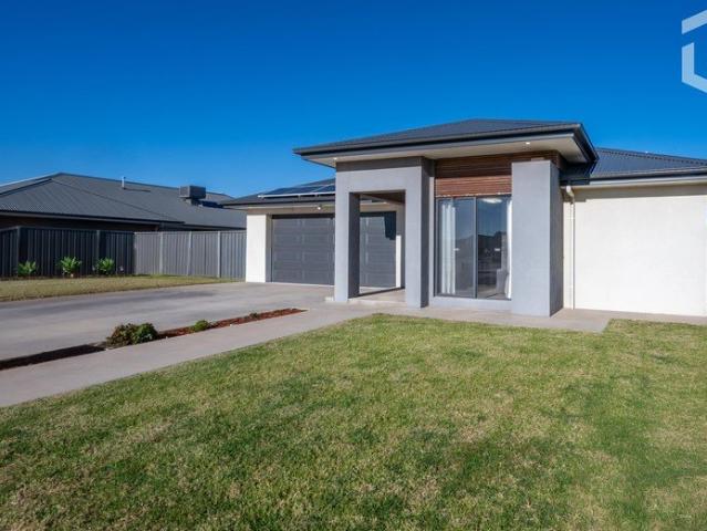 Contemporary Design with Flexible Family Living!