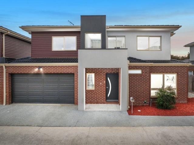 Contemporary Dual Level Living with Stylish Finishes and Mountain Outlooks