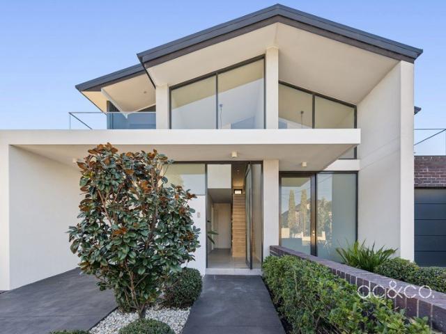Contemporary duplex with generous family appeal