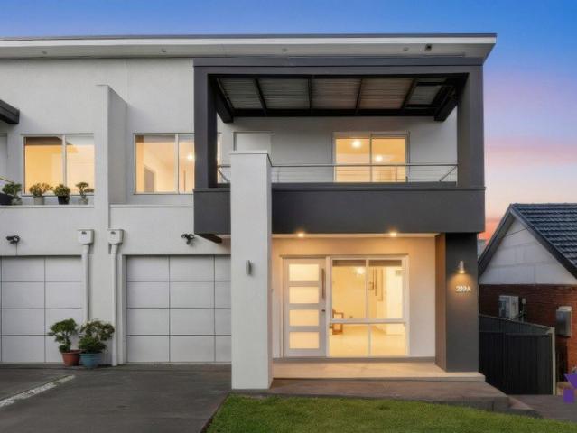 Contemporary duplex with private yard just 600m from everyday amenities