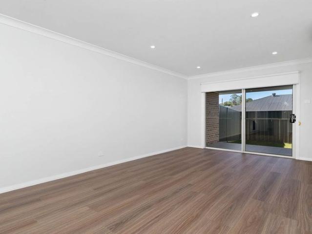 CONTEMPORARY EASY CARE LIVING IN A BRAND NEW DUPLEX