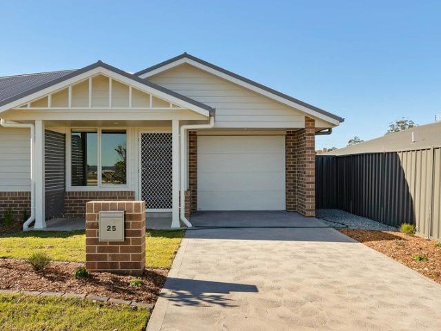 CONTEMPORARY EASY CARE LIVING IN A BRAND NEW DUPLEX