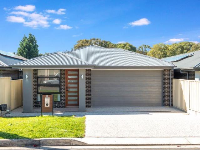 Contemporary Elegance. Exceptional Family Living!