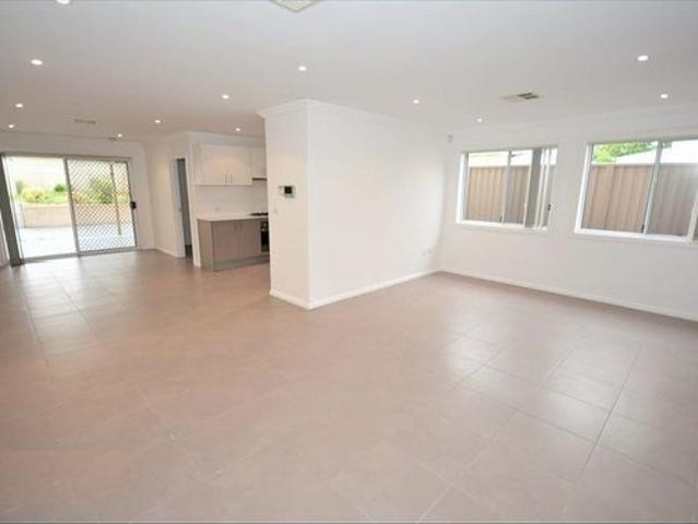 Contemporary Family Duplex in a Convenient Location in a highly sought after area