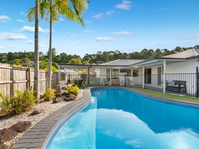 Contemporary family entertainer with pool and fire pit terrace