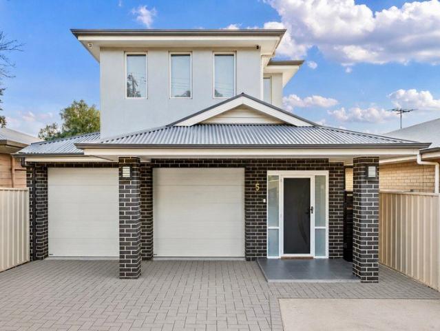 Contemporary Family Luxury with Coastal Views, Solar Power & Exceptional Parking