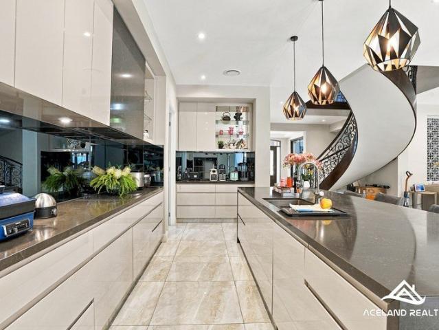 Contemporary Family Luxury with Pool, Media Room & Dual Kitchens