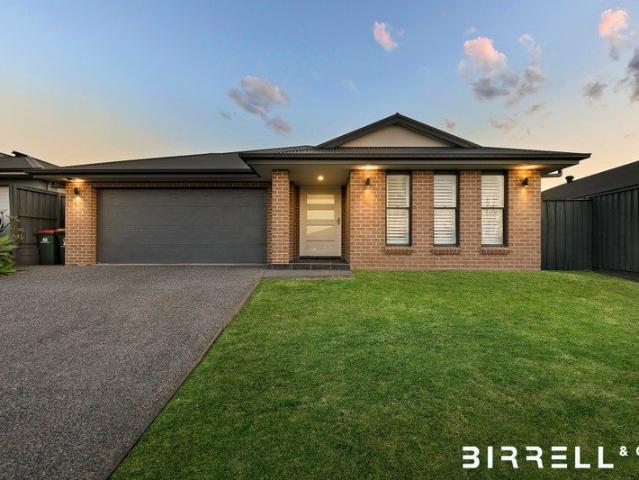 Contemporary Family Luxury with Premium Upgrades & Exceptional Versatility