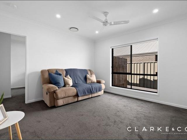 CONTEMPORARY FAMILY LIVING WITH MULTIPLE LIVING ZONES!