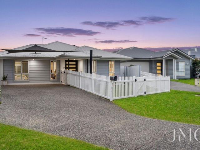 Contemporary Family Living with Multiple Living Areas & Resort Style Pool