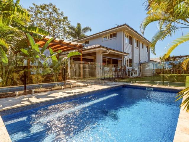 Contemporary Family Living with a Resort Style Pool
