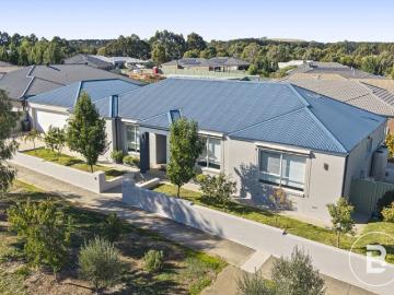 CONTEMPORARY FAMILY LIVING WITH EXCEPTIONAL SPACE AND APPEAL