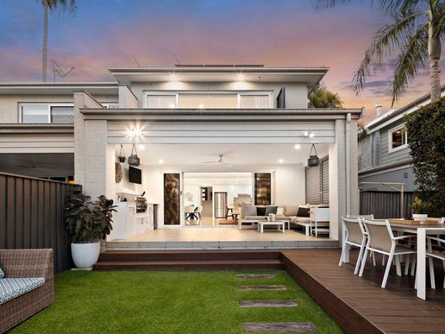 Contemporary family living with harbour glimpses and resort style entertaining