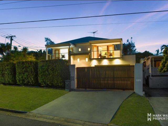 CONTEMPORARY FAMILY LIVING WITH SPACE, STYLE AND LEAFY FOREST VIEWS