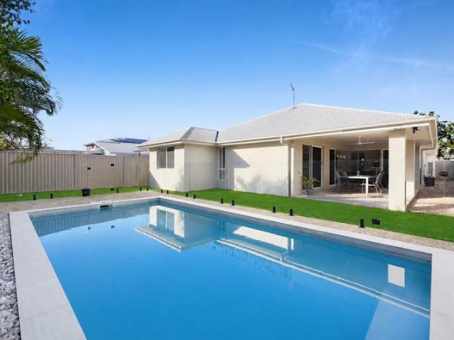 Contemporary Family Living in a Highly Sought After Biggera Waters Location
