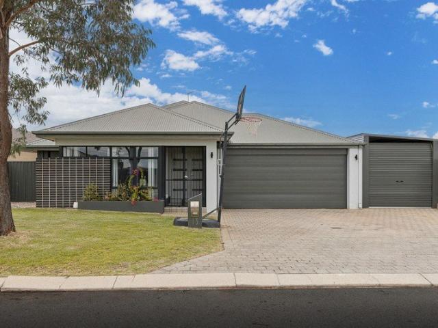 CONTEMPORARY FAMILY RESIDENCE WITH INVITING POOLSIDE GARDENS AND ADDED PARKING POTENTIAL
