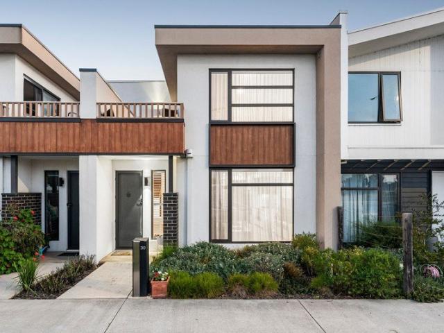 Contemporary First Class Living in the Heart of the Coast!