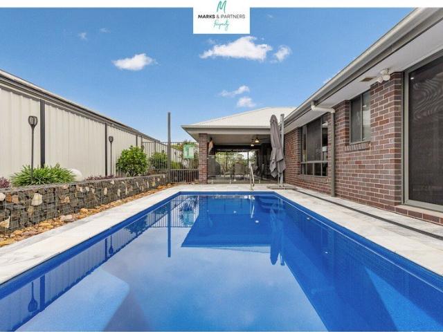 Contemporary Oasis on Low Maintenance Grounds
