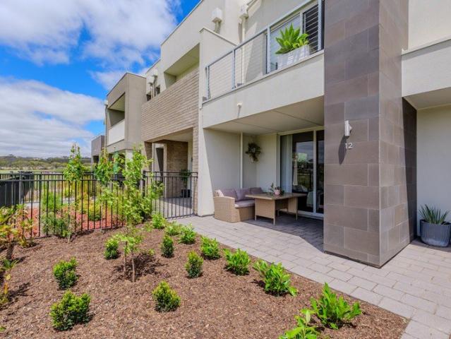 Contemporary, Low Maintenance Townhouse With Exclusive Polo Ground Views