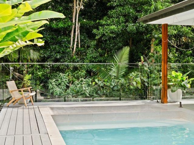 Contemporary Living with a Stunning Rainforest Backdrop