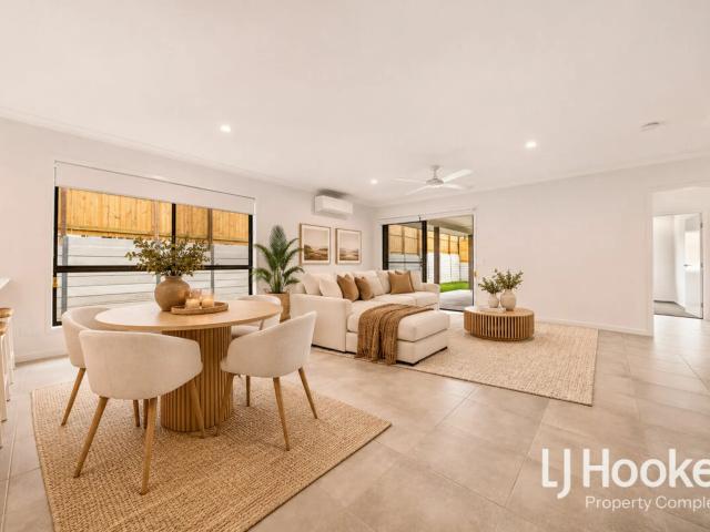 Contemporary Luxury, Premium Finishes & Three Separate Living Areas!
