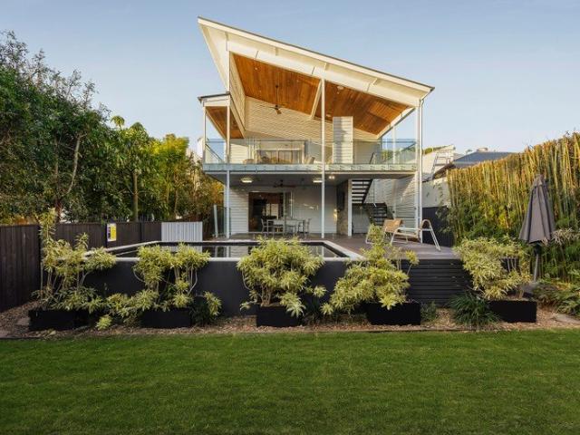 Contemporary masterpiece Dual living options, multiple entertaining spaces, room for all your toys!
