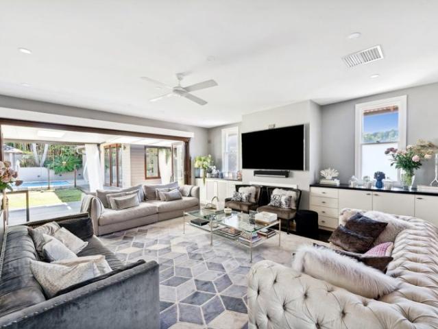 Contemporary Sandstone Home Boasting Classic Charm and Space