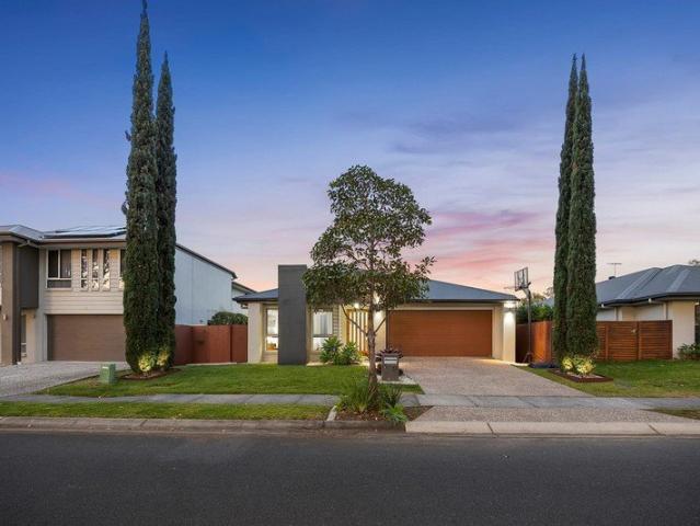 Contemporary Single Level Family Living with Poolside Entertaining
