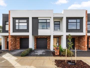 Contemporary Style & Convenience in a Thriving Lifestyle Location