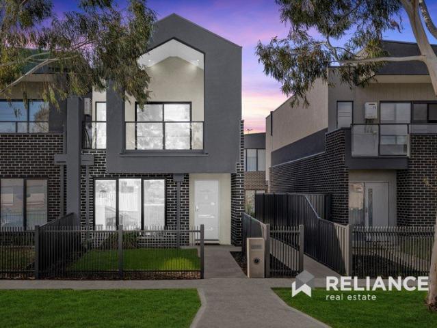 Contemporary style, low maintenance living, and an unbeatable location!