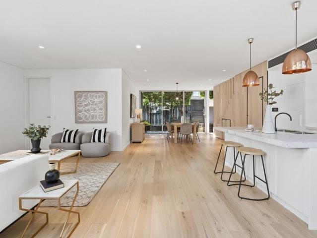Contemporary Sunlit Residence In Prized Village Setting