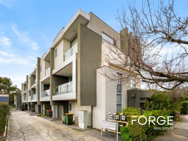 Contemporary Townhouse Living in a Premier Location