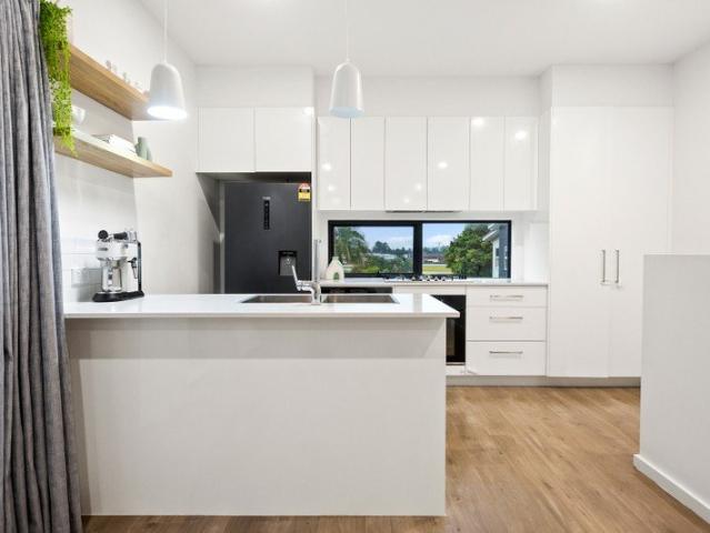 Contemporary Townhouse Living Moments from Lake Illawarra