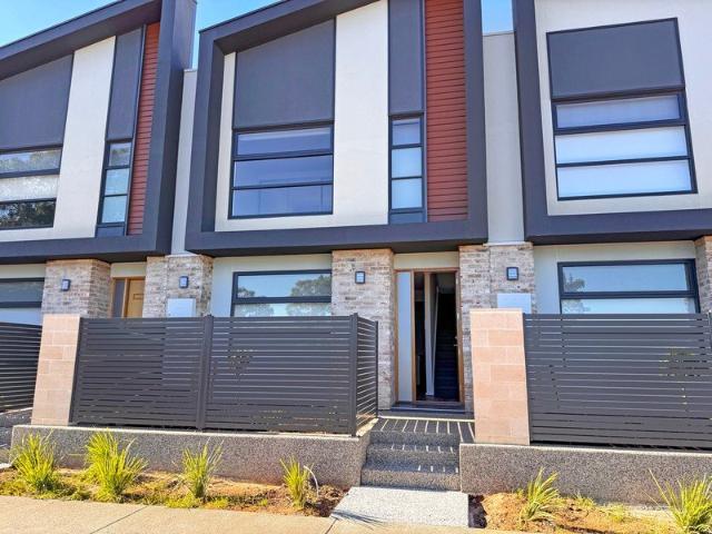 Contemporary Townhouse Living Opposite the Water and Reserve!
