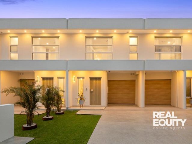 Contemporary Three Bedroom Terrace with Brushed Gold Finishes in Holsworthy