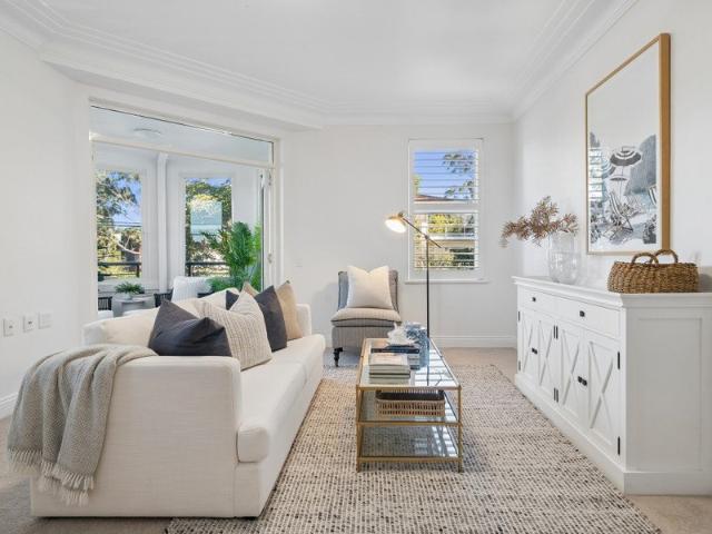 Contemporary three bedroom apartment in a prime village setting