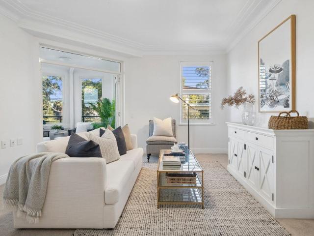 Contemporary three bedroom apartment in a prime village setting