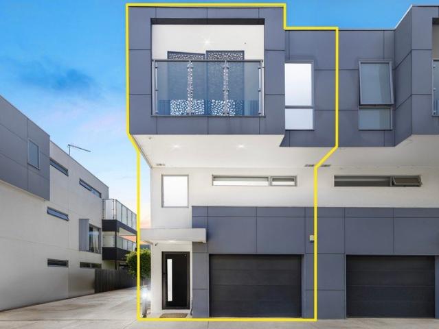 Contemporary Three Level Residence with Multiple Balconies and Courtyard Living!