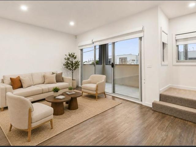 Contemporary Three Level Townhouse with Multiple Outdoor Spaces