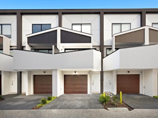 Contemporary Three Level Townhouse with Stylish Finishes