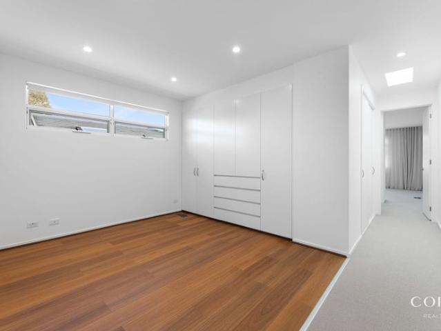 Contemporary Two Level Residence with A Private Garden in Malvern East!