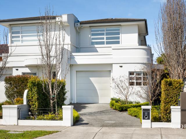 Contemporary Two Level Residence with A Private Garden in Malvern East!