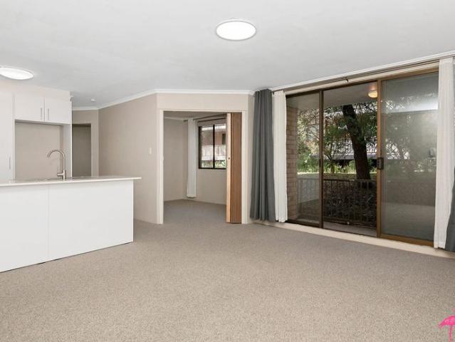 Contemporary unit in ultra convenient location!