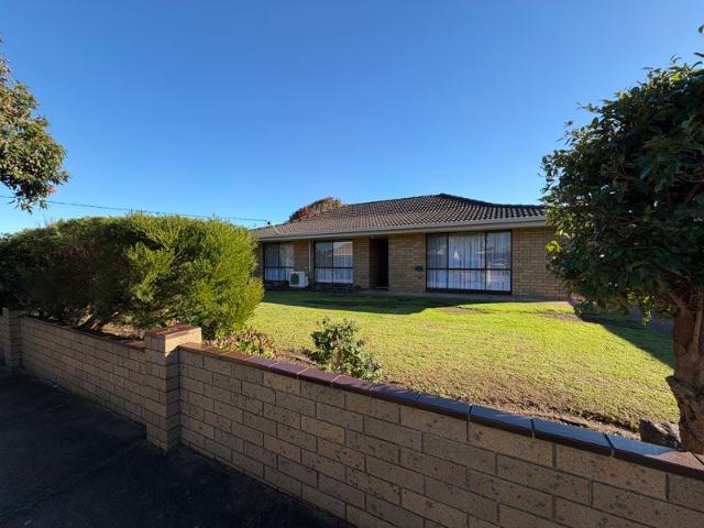 Convenient Central Location with Spacious Backyard