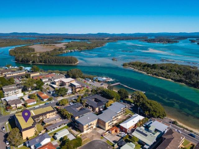 Convenient Coastal Living with Plenty of Potential