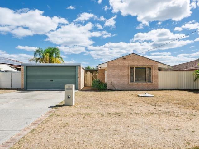 CONVENIENT FAMILY LIVING WITH SIDE ACCESS AND A WORKSHOP TO THE BACKYARD