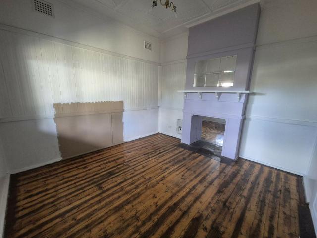 Convenient Located 2 Bedroom Home with Extra Large Backyard!