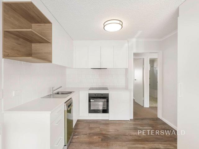 Convenient, Low Maintenance Living in New Town